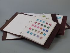 A set of four Stanley Gibbons Great Britain stamp albums 1840-2008 Vol 1 includes 1840 1d black