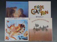 Approximately 130 albums including Dire Straits (6), Blood, Sweat and Tears (6), Moody Blues (6),