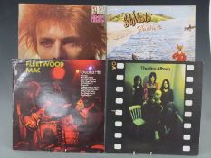 Approximately 120 LPs including Yes, Genesis, Fleetwood Mac, Human League, David Bowie, The Cure and