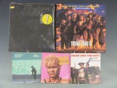 Approximately 20 LPs and 12 inch singles including an Abba box set, AC/DC, Aerosmith, also