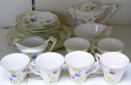 James Kent Art Deco teaset decorated with flowers in the Clarice Cliff style, 23 pieces