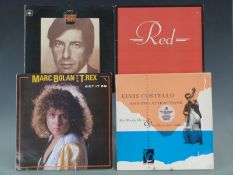 Approximately 100 albums including Marc Bolan, T.Rex, Elvis Costello, Leonard Cohen and The