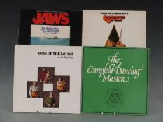 Approximately 90 albums including soundtracks and folk