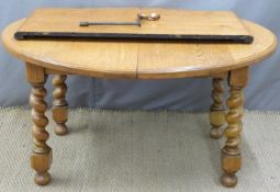 Oak wind out extending dining table raised on barley twist legs, max L172 min 128 x W105 x H70cm