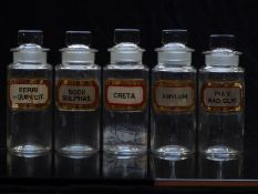 A set of five chemists/ pharmacy glass apothecary bottles with gilt labels including Creta and Sodii