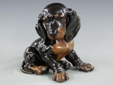 Professor Theodore Karner for Rosenthal porcelain figure of a puppy, impressed 1242 to base, 15cm