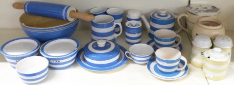 A collection of T G Green and further retro kitchen ware including rolling pins, yellow striped