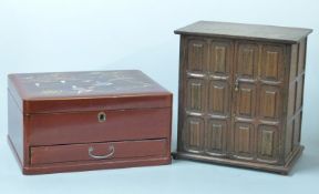 An early 20thC oak smoker's cabinet and a Japanese lacquer jewellery box with fitted interior, H28 x
