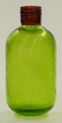 A green art glass bottle vase with wrythen moulded body and trailed brown collar, 25cm tall.