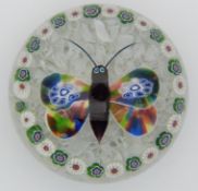 Baccarat glass garlanded butterfly paperweight decorated with a central butterfly with purple