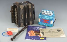 Voights Criterion German two stop accordion / melodeon, c1910, together with a child's melodeon with