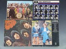 The Beatles - six LPs plus six others. Please Please Me, With, Hard Days, Help, Rubber Soul and Sgt.