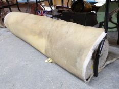 A large bolt of grey velour fabric with hemmed edges, haberdashery / textiles / upholstery interest,