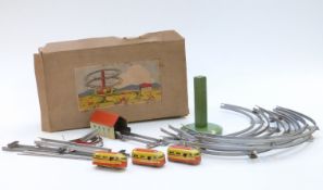 J H Toys German clockwork tinplate Tower Railway with three railcars all marked 'Made in U.S. Zone