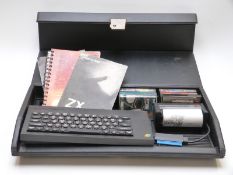 Sinclair ZX Spectrum vintage personal computer together with various games and a ZX Printer, in