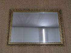 Gilt framed mirror with bevelled glass, 72 x 102cm overall