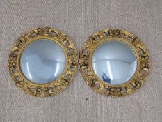 A pair of convex butler's mirrors, overall diameter 50cm