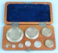 Edward VII cased set of County of Monmouth standard weights from 8oz to 1/2 dr, all numbered 2897