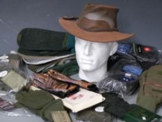 A selection of shooting gloves, oversocks, ties etc together with overtrousers and a Kakadu