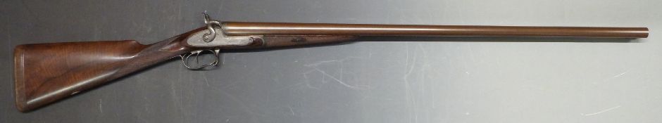 James Purdey 10 bore side by side hammer action shotgun, named locks, all over fine scrolling