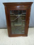 A 19thC astragal glazed hanging mahogany corner cupboard, height 75cm
