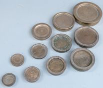 Three runs of Georgian flat stacking weights, many with G below crown and A T monogram