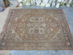 Large handmade Eastern rug or carpet having beige or teraccota ground with central blue and beige