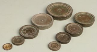 Two runs of Georgian flat stacking weights, many with G below crown and A T monogram marks, and