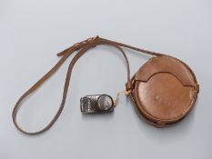 WWII military marked leather film holder marked Timbers 1940 and R.F.G.R. and a light meter,