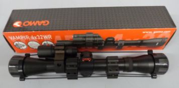 Gamo Vampir 4x32 WRV rifle scope with laser sight and light, new in original box.