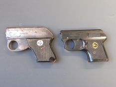 Two starting pistols a JHA perfect and a ROHM RG2 example