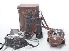 7 x 50 Navylux binoculars, Minolta X-300 SLR and an Agfa Silette camera
