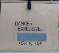 A wooden black powder storage box marked Danger Explosives 028 & 029, 47x32x21cm.