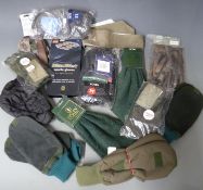 A selection of shooting gloves, oversocks, overtrousers etc together with Mae West sports gloves,