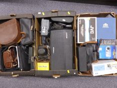 A quantity of cameras, accessories etc to include Zenit E, Zenith 10x50 binoculars, JVC digital