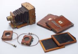 Mahogany and brass folding plate camera with J Lancaster & Sons patent lens, two Thornton Pickard