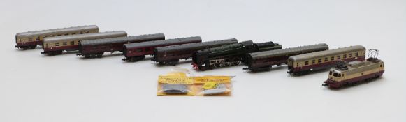 Nine Trix and Lima N gauge locomotives and coaches including Britannia and DB 112 309-0