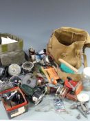 A collection of vintage fixed spool reels together with four fly reels and two multipliers plus