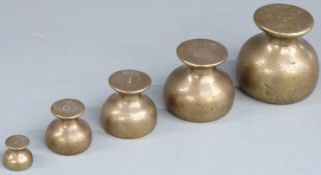 A run of five Georgian bun-shaped weights marked Rd 160990, from 4lb to 2oz, GR and later ciphers to