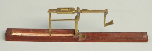 Georgian mahogany cased folding guinea or sovereign scale with flip-over weight and instructions