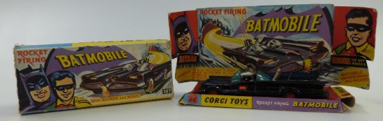 Corgi Toys diecast model Batmobile 1st type with no tow hook, black body, figures and bat logo