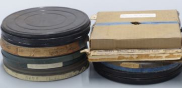 Eight 9.5mm Charlie Chaplin and Laurel & Hardy cine film reels to include examples marked 'The