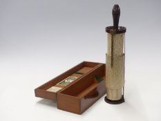 Cased Stanley spiral slide rule marked Fuller calculator with scale of sines & logs, with Bakelite