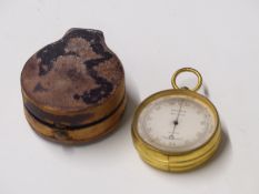 19thC cased brass pocket barometer marked Braham optician Bath and in original case