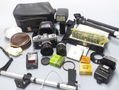 Canon FTb SLR camera with 50mm 1:1:8 lens and Soligor 1:2:8 f=28mm and 75-260mm 1:4:5 lenses,