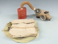 WWII standard issue gas mask with canvas bag dated 1941