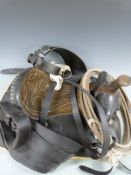 South American western style leather saddle with embossed decoration, stirrups, engraved studs and