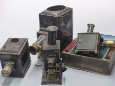 Four magic lantern and similar projectors including a boxed German J S  example