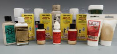 A collection of gun cleaning and restoring materials including gun grease, gunstock polish etc.