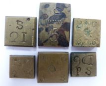 Six various brass square coin weights impressed 10s 6d, 5 P:WT etc with coffee pot, star and crown